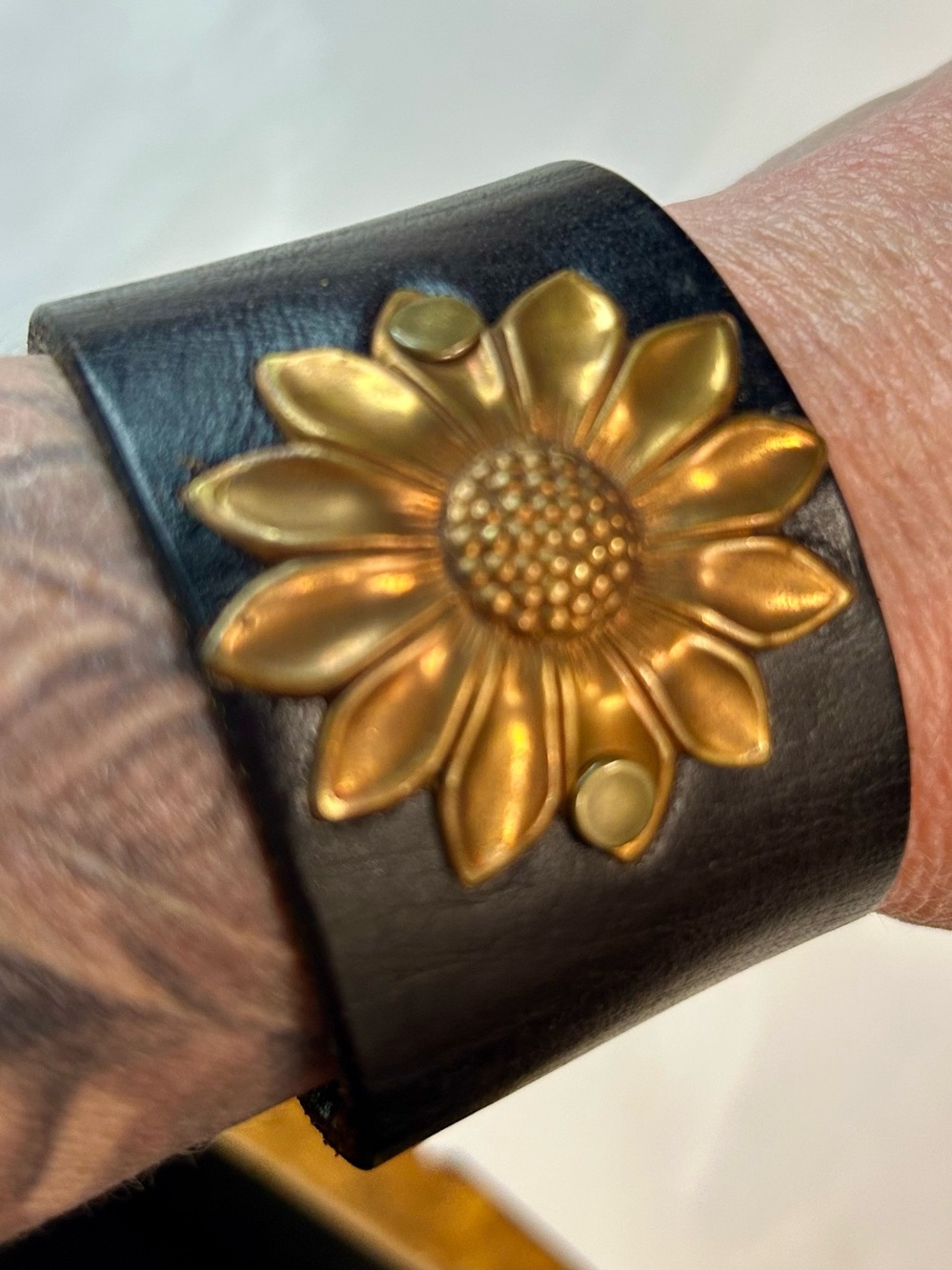 Boho Dark Leather Wide Cuff
Bracelet with Brass Sunflower
Centerpiece - 9"